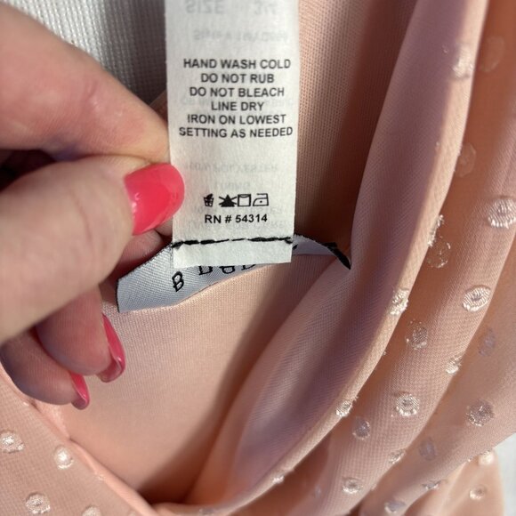 Pink Polka Dot Sleeveless Wrap Dress With Bow Detail & Zipper Closure - Picture 14 of 14